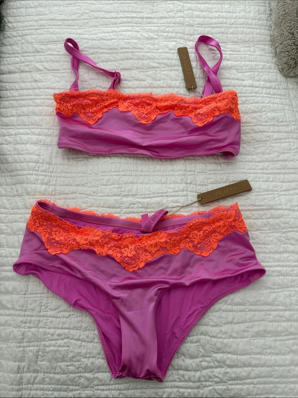 SKIMS Two-Piece Swim Bikini in Magenta with Neon Orange Lace